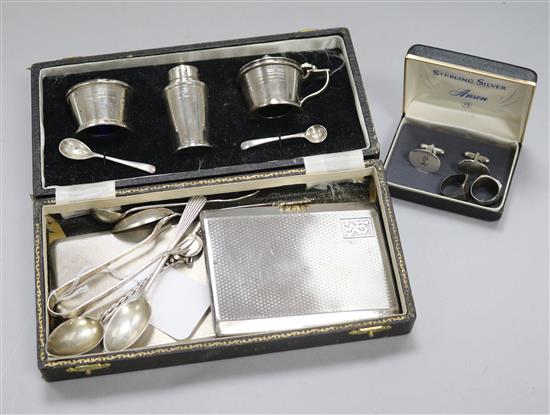 A three-piece silver cruet, cased, two silver cigarette cases, sundry spoons, etc.,